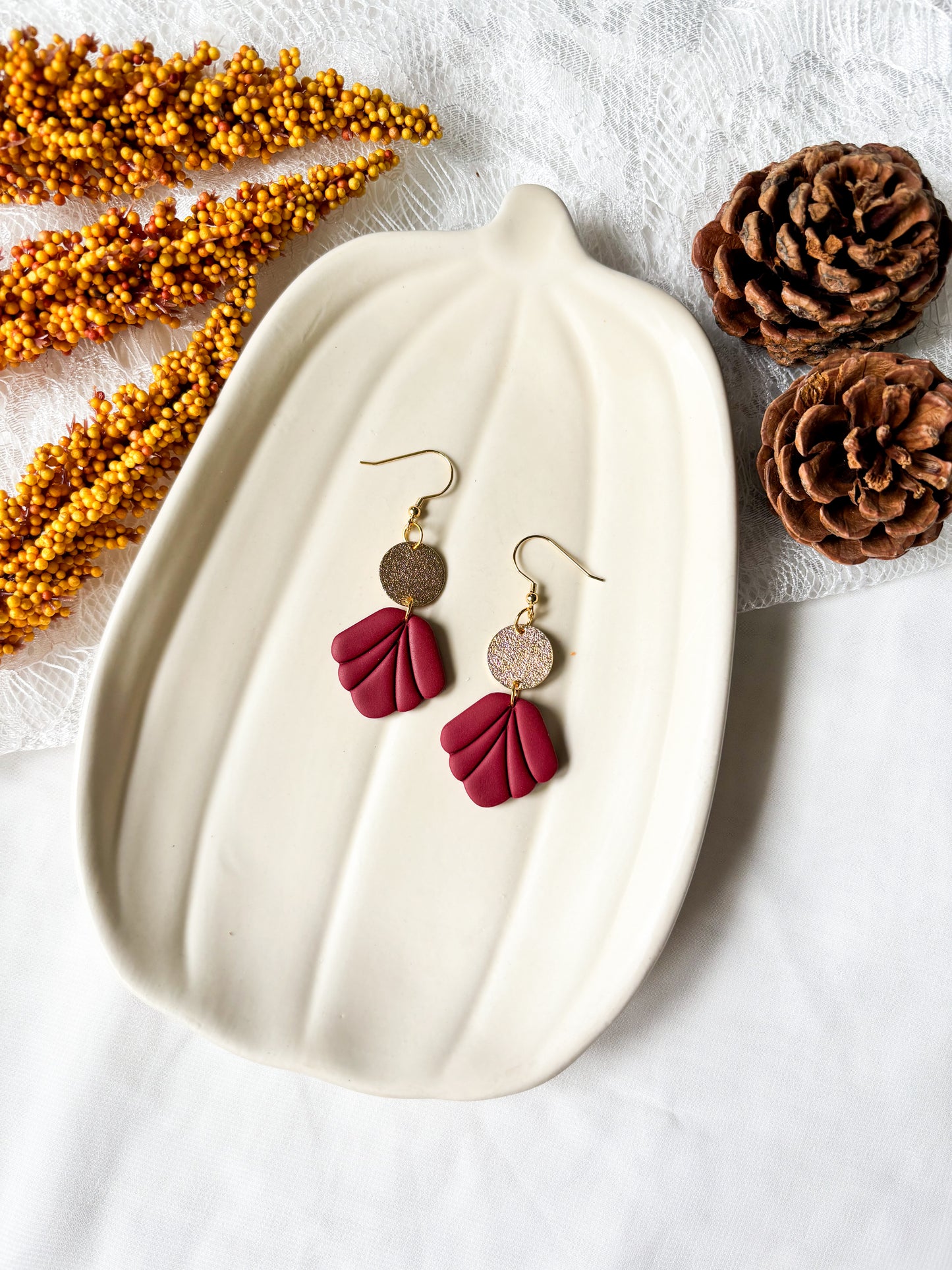 Scalloped dangles with shiny disc charm
