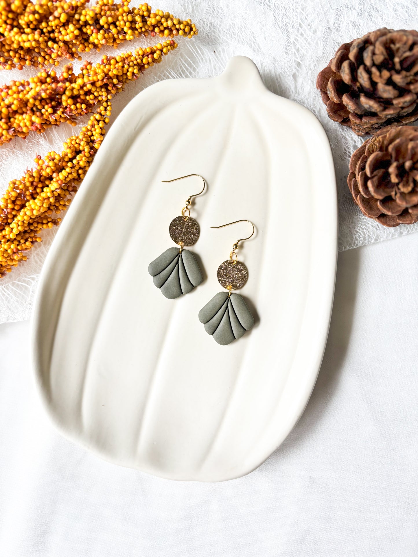 Scalloped dangles with shiny disc charm
